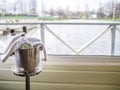 Misted bucket with ice and alcohol is on the stand in restaurant