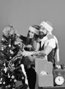 Mister and Missis Claus with red and blue gifts Royalty Free Stock Photo