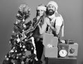 Mister and Missis Claus with red and blue gifts Royalty Free Stock Photo