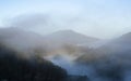 The mists of dawn cover the Urumea river valley Royalty Free Stock Photo