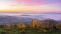 misty autumn sunrise in mountains Royalty Free Stock Photo