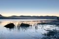 Misty blue hour scene at Bassenthwaite Lake in The Lake District National Park, Cumbria Royalty Free Stock Photo