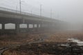 Misty bridge.After the time has elapsed, the density of fog under the bridge is gradually diluted and melts.