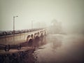 Misty bridge to a lonely island