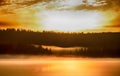 Misty calm evening on the forest lake, sunset Royalty Free Stock Photo