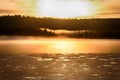 Misty calm evening on the forest lake, sunset Royalty Free Stock Photo