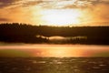 Misty calm evening on the forest lake, sunset Royalty Free Stock Photo