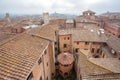 Misty cityscape of Siena, Tuscany town roofs and old houses. Italian city, UNESCO World Heritage Site Royalty Free Stock Photo