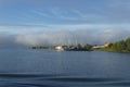 Misty clouds over river bank in the morning Royalty Free Stock Photo