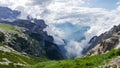 Misty and cloudy valley in mountains, Tre Cime, Italy Royalty Free Stock Photo