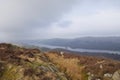 Misty Coniston Water: lake in English Lake District from mountain moor Royalty Free Stock Photo