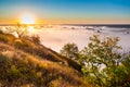 Misty dawn from hill over Valley and the forest Royalty Free Stock Photo