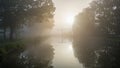 Misty Dawn Reflections by the Riverside Royalty Free Stock Photo