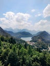 Alps and lakes in a summer day in Germany. Taken from the hill next to Neuschwanstein castle. View of the Hohenschwangau castle, Royalty Free Stock Photo