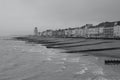 Beach landscape at Hastings with the victorian buildings along the promenade