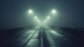 A misty fog envelops a deserted highway creating an ethereal and ghostly ambiance in the dead of night. .