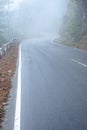 misty fog over empty road in mountains