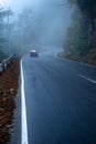 misty fog over empty road in mountains