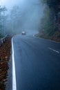 misty fog over empty road in mountains