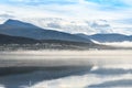 Misty fog over the lake, Tromso, Norway Royalty Free Stock Photo