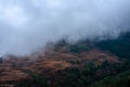 misty fog over village in mountains