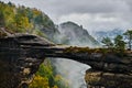 Misty foggy landscape of the Pravcicka gate Pravcicka brana the largest natural sandstone arch in Europe in Czech Switzerland