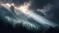 Misty forest with sun rays breaking through dark clouds over mountain peak creating dramatic light Royalty Free Stock Photo