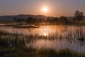 Misty Golden Sunrise Reflecting over Lake in Spring Royalty Free Stock Photo