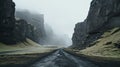 Mystical Journey: A Captivating Road Through A Foggy Rocky Landscape Royalty Free Stock Photo