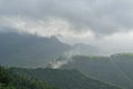 Misty green grass covered mountains of Matheran a hill station nestled in western ghats of India during rainy monsoon season Royalty Free Stock Photo