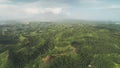 Misty green rainforest mounts aerial view at Legazpi, Philippines, Asia. Heavy rain cloudy sky Royalty Free Stock Photo