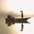 Misty lake boat