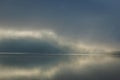 Misty Lake Dawn With Small Boat, Silent Water Royalty Free Stock Photo