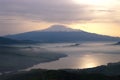 Misty on lake and mount Etna Royalty Free Stock Photo