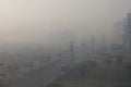 Misty Morning Blurred by Smog Building Construction Street New Delhi India Royalty Free Stock Photo