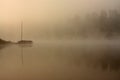 Misty morning boat at the lake Royalty Free Stock Photo