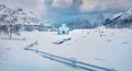 Misty morning after huge snowfall over polar circle. Snowy winter scene of Lofoten Islands.