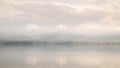 Misty morning of lake and mountain range Royalty Free Stock Photo