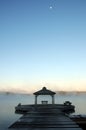 Misty morning at Lake Rosseau Pier with moon Royalty Free Stock Photo