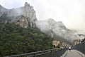 Misty morning in the Montserrat mountains at Benedictine abbey Santa Maria de Montserrat, Spain