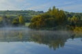 Misty morning over the lake Royalty Free Stock Photo