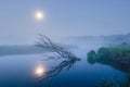 Misty Morning River in Forest with Full Moon Royalty Free Stock Photo