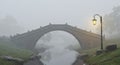 Misty Morning Stone Bridge and Lamp Post Royalty Free Stock Photo