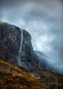 Misty morning view of Kjelfossen Waterfall, Gudvangen, Sogn og Fjordane, Norway