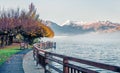 Misty morning view of Zell lake. Calm autumn scene of Austrian Alps, with Grossglockner peak on background. Beauty of nature Royalty Free Stock Photo