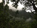 Misty Mountain Cliffs near Hanakapiai Falls along NaPali Coast on Kauai Island, Hawaii. Royalty Free Stock Photo