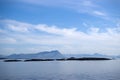 Misty mountain coast near Bodo viewed from ferry to Lofoten