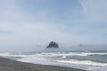 Misty Mountain with Forest on the seashore at Rialto Beach. Olympic National Park, WA Royalty Free Stock Photo