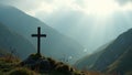 Misty mountain iron cross with moss illuminated by a sacred beam of light Royalty Free Stock Photo