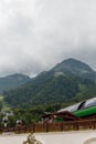 Misty mountain landscape with fir forest. Beautiful landscape with mountain view, cable car